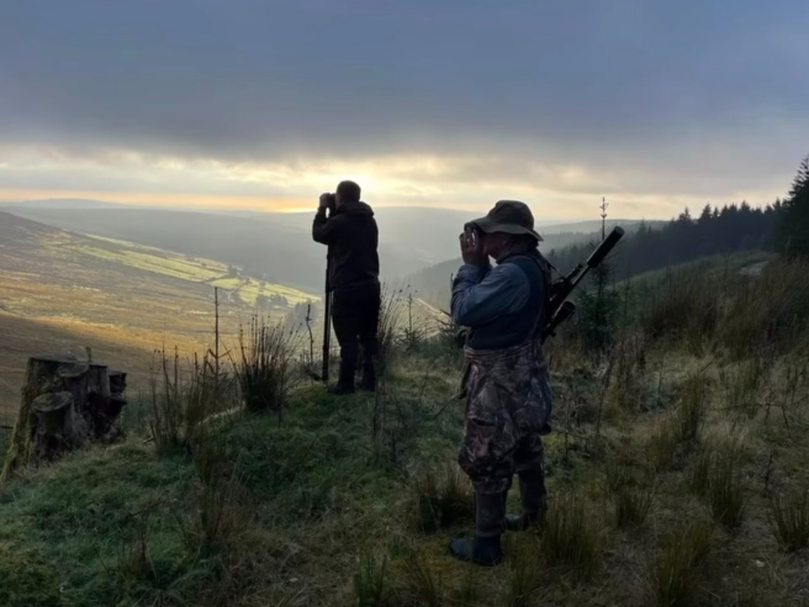 Jim Nolan glassing from a rocky ridge in the Wicklow Mountains